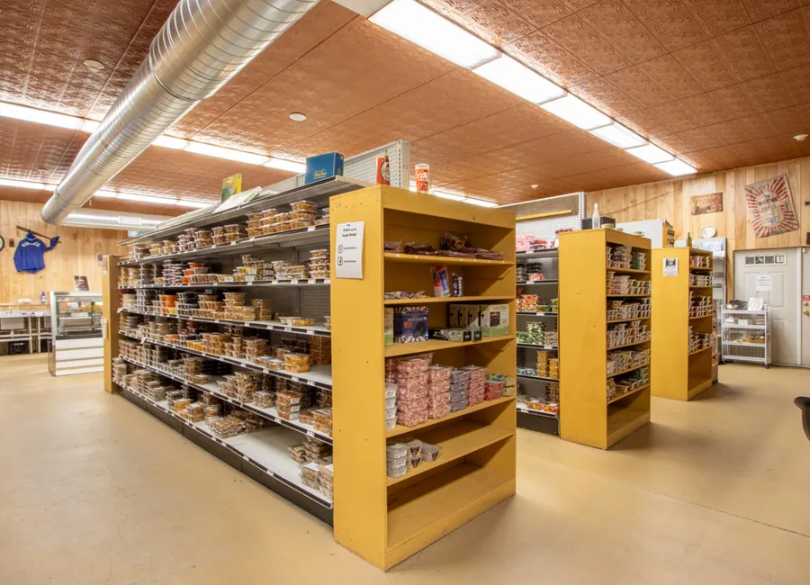 Dutch Market aisles with packaged goods and local foods
